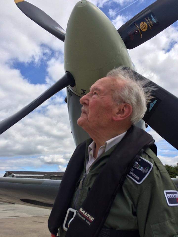 Peter Hale standing by a two seat spitfire after his spitfire experience