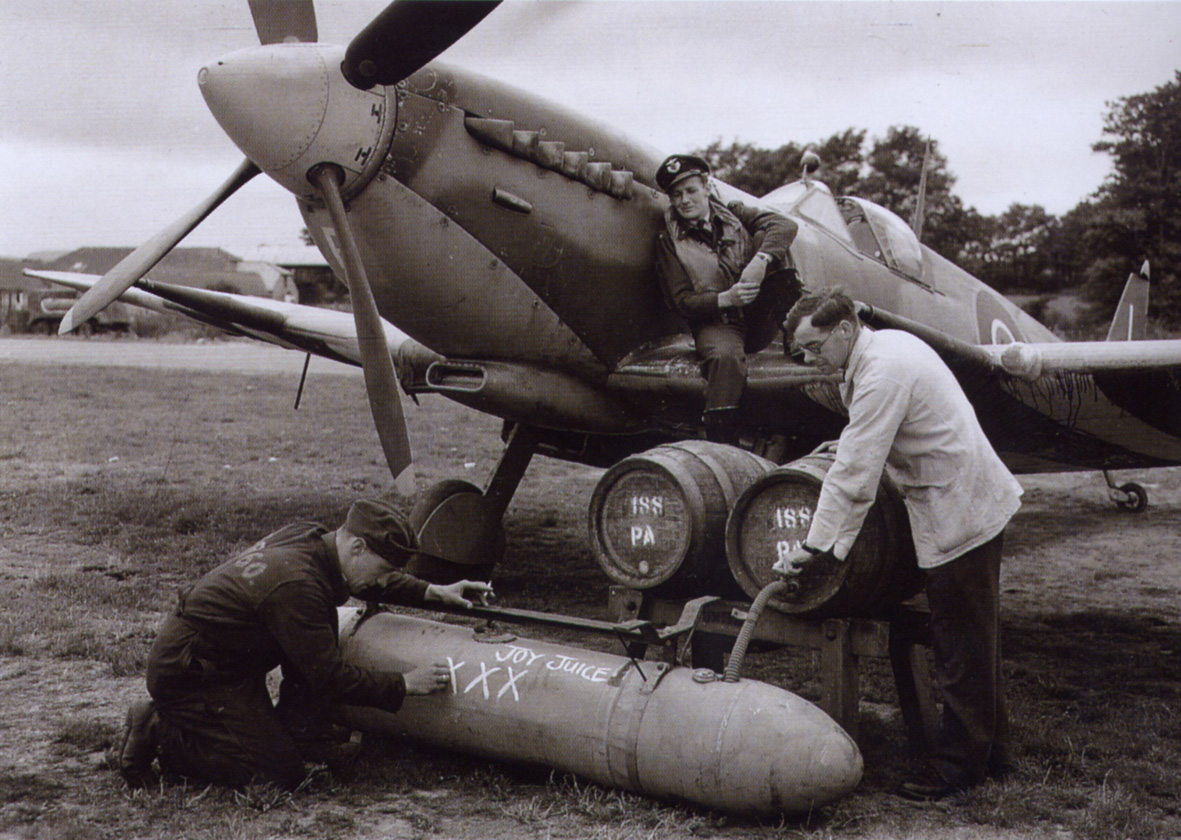 A Spitfire pilot have a beer after a Spitfire experience flight