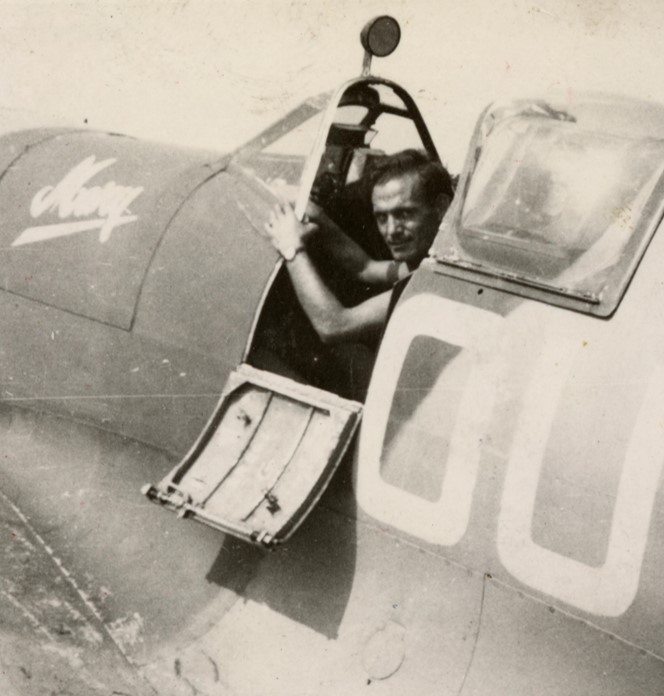 Spitfire pilot prepares for a flight in a Spitfire